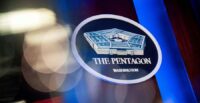 The Pentagon logo is seen behind the podium in the briefing room at the Pentagon