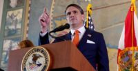 Todd Blanche speaks at a news conference