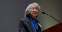 Pauline Newman is shown delivering remarks from a lectern in 2023