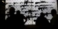 AR-15 rifles are displayed at an exhibition booth during the National Rifle Association annual convention in Dallas