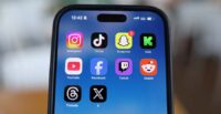FILE PHOTO: Social media apps are displayed on a mobile phone