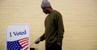 A man votes at a polling station in South Carolina's Democratic presidential primary in Columbia, S.C. on Feb. 29, 2020