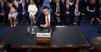 Acting U.S. Attorney General Todd Blanche takes his seat to testify before a Senate Judiciary Committee confirmation hearing