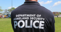 DHS-officer-Depositphotos_48831555_XL-w-875×463